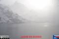 Schneegestöber und Nebel im Trollfjord